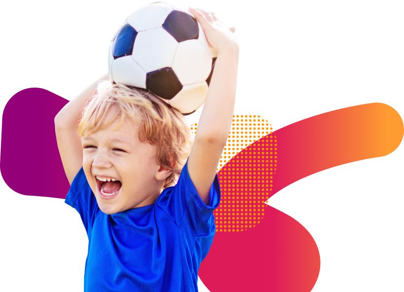 Boy holding a soccer ball on his head